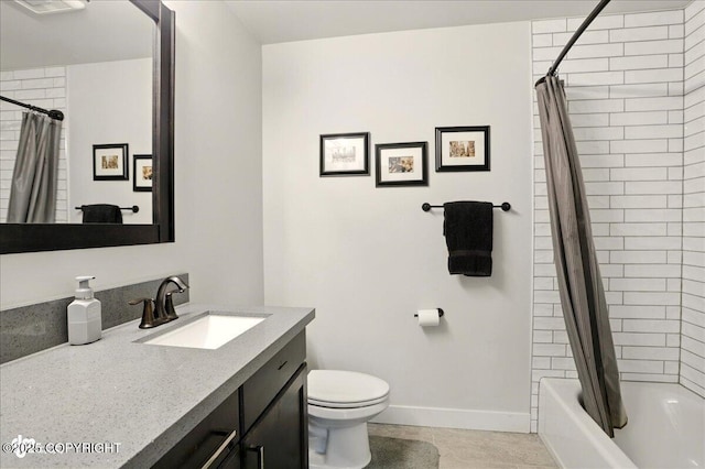 8727 Turlock Dr, Eagle River, AK 99577 - bathroom with vanity, toilet, shower / bath combo with shower curtain, baseboards, and tile patterned floors