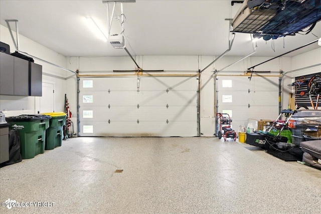 8727 Turlock Dr, Eagle River, AK 99577 - garage featuring a garage door opener