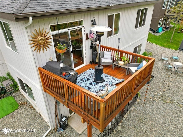 8727 Turlock Dr, Eagle River, AK 99577 - wooden terrace with an outdoor hangout area