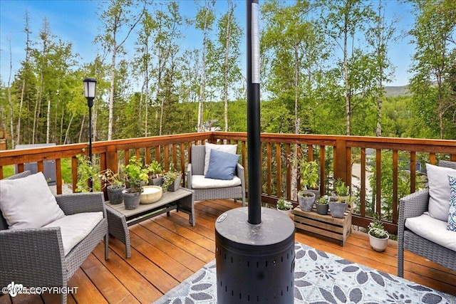 8727 Turlock Dr, Eagle River, AK 99577 - deck featuring an outdoor living space