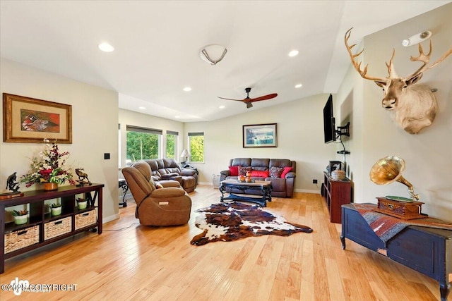 3872 N Charley Dr, Wasilla, AK 99654 - living room featuring light wood-type flooring, a ceiling fan, baseboards, vaulted ceiling, and recessed lighting