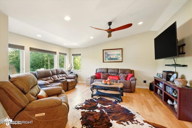 3872 N Charley Dr, Wasilla, AK 99654 - living area featuring light wood-type flooring, ceiling fan, recessed lighting, lofted ceiling, and baseboards