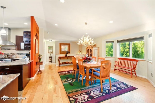 3872 N Charley Dr, Wasilla, AK 99654 - dining room featuring light wood-style floors, a chandelier, recessed lighting, and baseboards