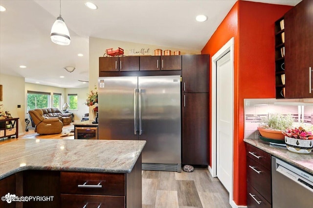 3872 N Charley Dr, Wasilla, AK 99654 - kitchen featuring stainless steel appliances, recessed lighting, light wood-type flooring, decorative light fixtures, and vaulted ceiling