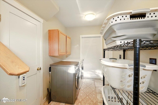 3872 N Charley Dr, Wasilla, AK 99654 - laundry room with cabinet space, independent washer and dryer, and light tile patterned floors