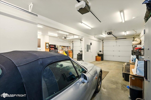 3872 N Charley Dr, Wasilla, AK 99654 - garage featuring a garage door opener and electric panel