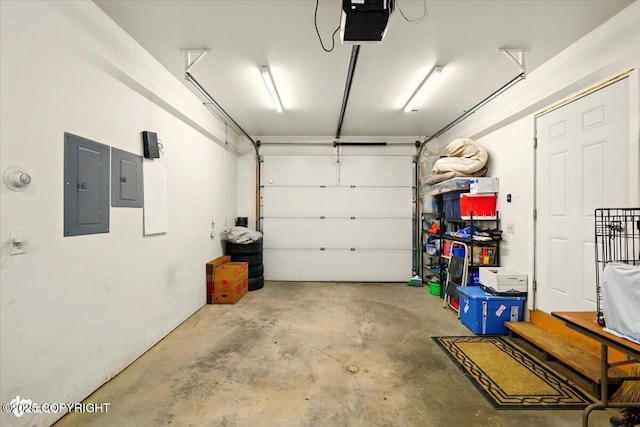 3872 N Charley Dr, Wasilla, AK 99654 - garage with electric panel and a garage door opener