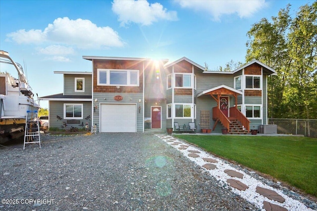3872 N Charley Dr, Wasilla, AK 99654 - view of front of property with an attached garage, gravel driveway, and central air condition unit