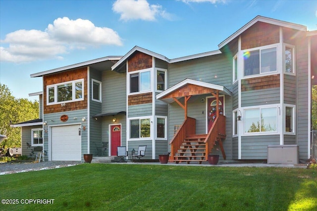 3872 N Charley Dr, Wasilla, AK 99654 - view of front of property with a garage, a front lawn, and gravel driveway