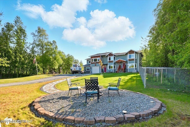 3872 N Charley Dr, Wasilla, AK 99654 - view of yard with a garage