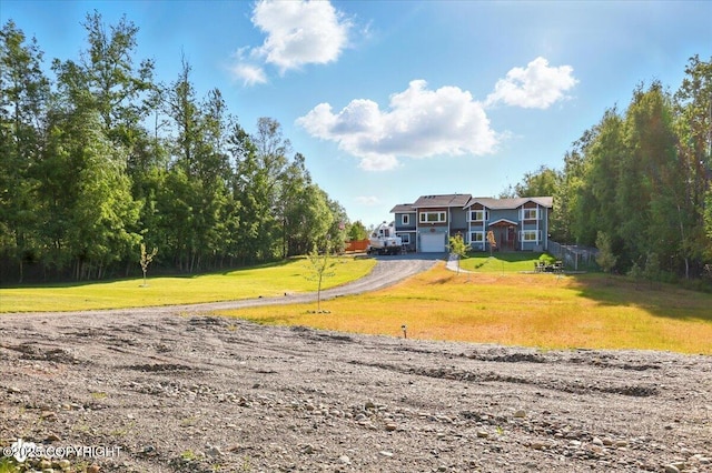 3872 N Charley Dr, Wasilla, AK 99654 - view of front of home featuring driveway and a front yard
