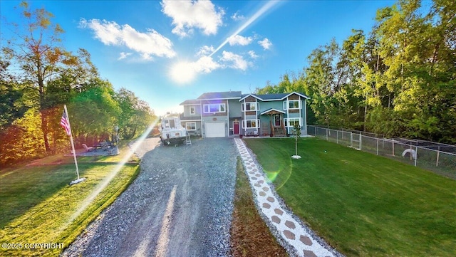 3872 N Charley Dr, Wasilla, AK 99654 - view of front of property featuring driveway, a garage, and an area to practice putting