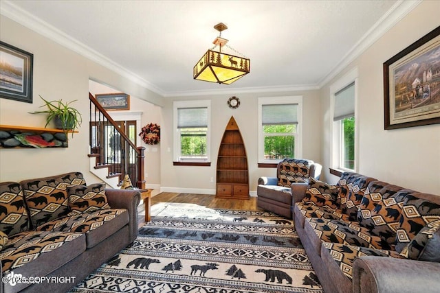 2034 E Sage Rd, Wasilla, AK 99654 - living area with wood finished floors, ornamental molding, stairway, and baseboards