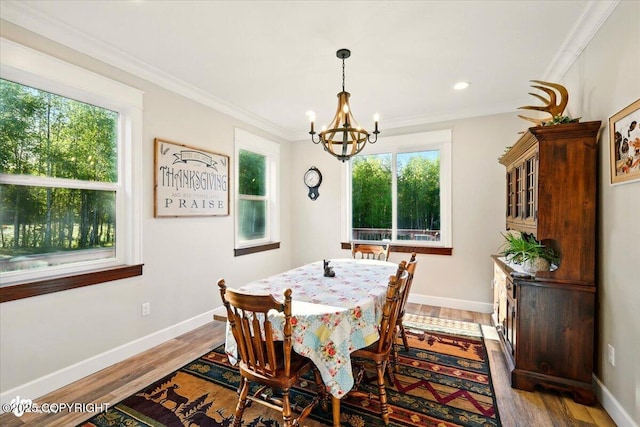 2034 E Sage Rd, Wasilla, AK 99654 - dining room with a chandelier, wood finished floors, baseboards, ornamental molding, and recessed lighting