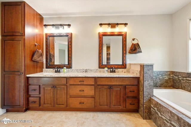 2034 E Sage Rd, Wasilla, AK 99654 - bathroom with double vanity and a bath