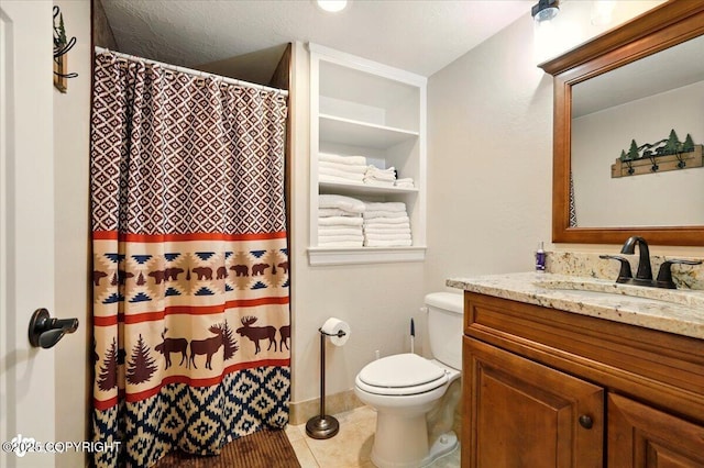 2034 E Sage Rd, Wasilla, AK 99654 - full bathroom with vanity, toilet, tile patterned floors, a shower with shower curtain, and baseboards