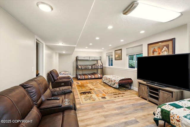 2034 E Sage Rd, Wasilla, AK 99654 - living area with wood finished floors, recessed lighting, and baseboards