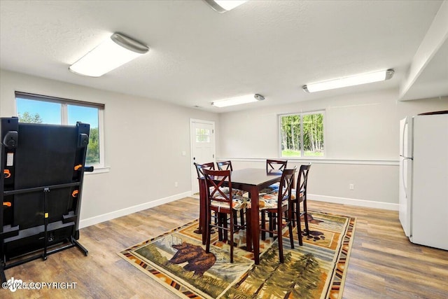 2034 E Sage Rd, Wasilla, AK 99654 - dining area with wood finished floors and baseboards
