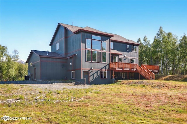 2034 E Sage Rd, Wasilla, AK 99654 - rear view of property with stairs, a deck, a yard, and central air condition unit