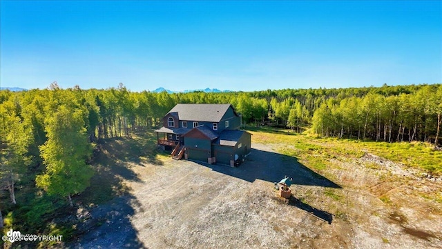 2034 E Sage Rd, Wasilla, AK 99654 - aerial view of property and surrounding area with a heavily wooded area