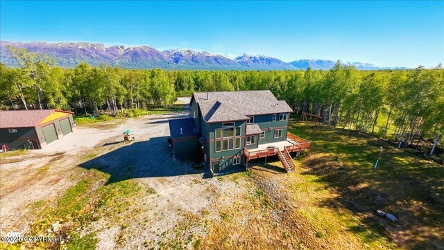 2034 E Sage Rd, Wasilla, AK 99654 - view from above of property featuring mountains and a heavily wooded area