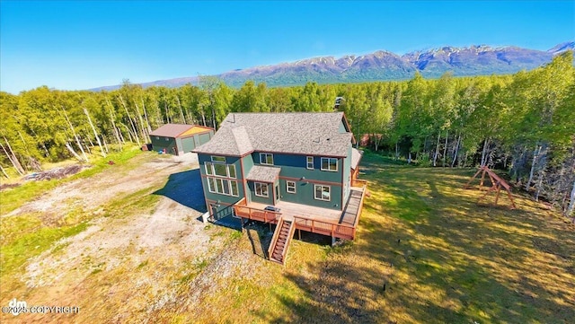 2034 E Sage Rd, Wasilla, AK 99654 - view from above of property featuring a mountainous background and a heavily wooded area