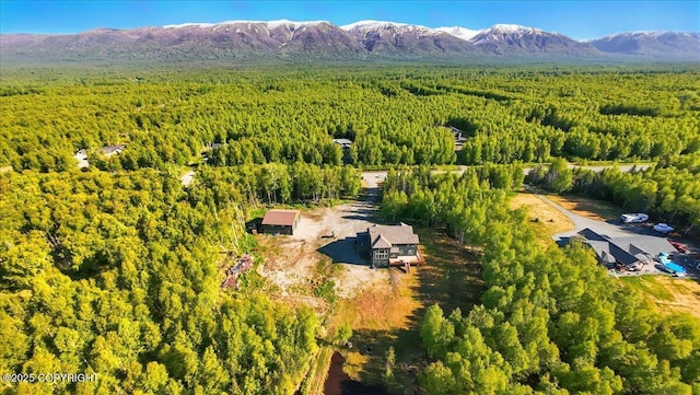 2034 E Sage Rd, Wasilla, AK 99654 - aerial view of a heavily wooded area and mountains