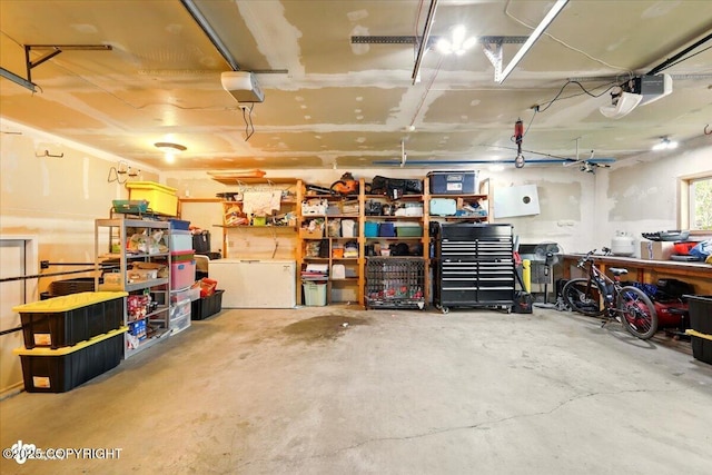 751 W Crestwood Ave, Wasilla, AK 99654 - garage featuring refrigerator and a garage door opener