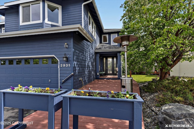 2931 Captain Cook Estates Cir, Anchorage, AK 99517 - view of front facade with a garage