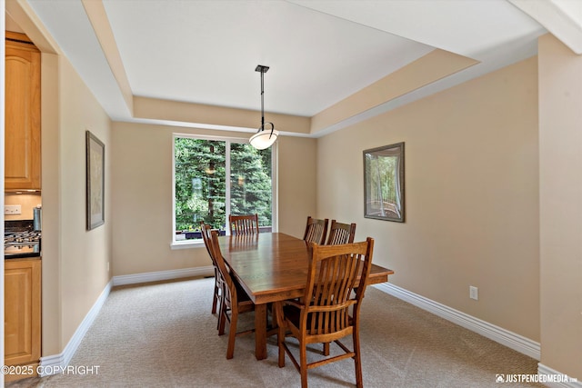 2931 Captain Cook Estates Cir, Anchorage, AK 99517 - dining room with light carpet, baseboards, and a raised ceiling
