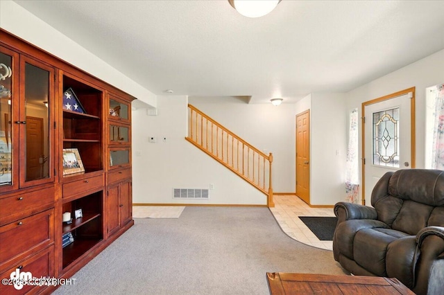 500 S Daysha Cir, Palmer, AK 99645 - living room with stairs, light carpet, and baseboards