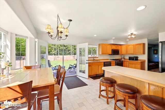 500 S Daysha Cir, Palmer, AK 99645 - kitchen with gas stove, black microwave, healthy amount of natural light, light countertops, and recessed lighting