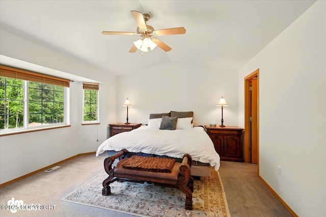 500 S Daysha Cir, Palmer, AK 99645 - bedroom with light colored carpet, baseboards, vaulted ceiling, and a ceiling fan