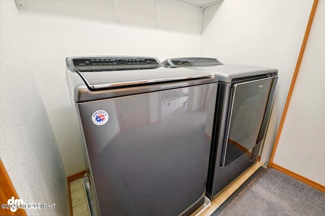500 S Daysha Cir, Palmer, AK 99645 - laundry area featuring separate washer and dryer, light carpet, and baseboards