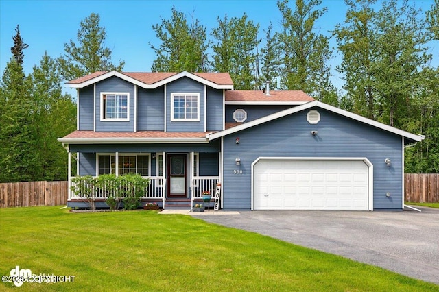 500 S Daysha Cir, Palmer, AK 99645 - view of front of home featuring covered porch, a garage, driveway, and a shingled roof