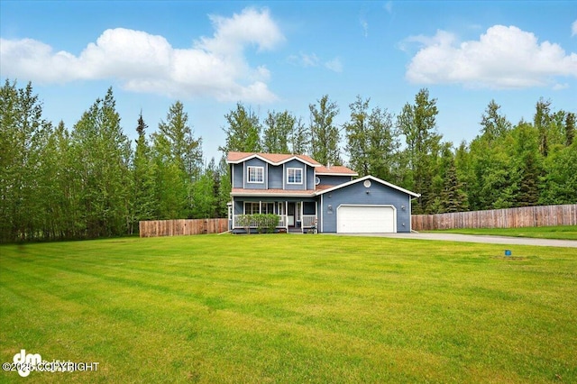 500 S Daysha Cir, Palmer, AK 99645 - traditional home with a porch, asphalt driveway, and an attached garage