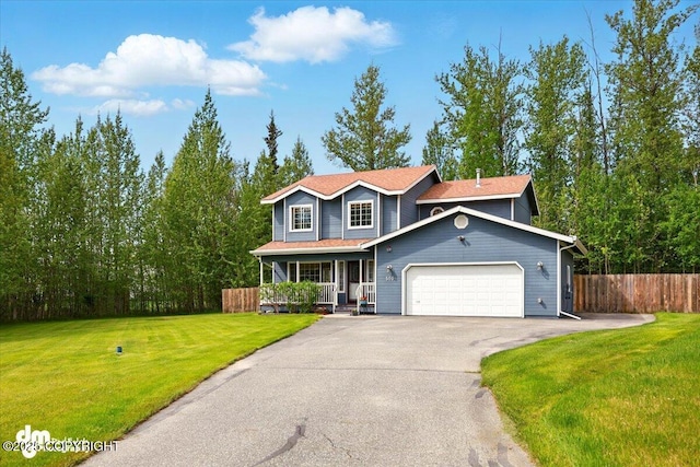 500 S Daysha Cir, Palmer, AK 99645 - traditional-style home featuring a porch, an attached garage, and driveway