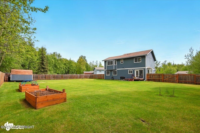 500 S Daysha Cir, Palmer, AK 99645 - back of house featuring a vegetable garden