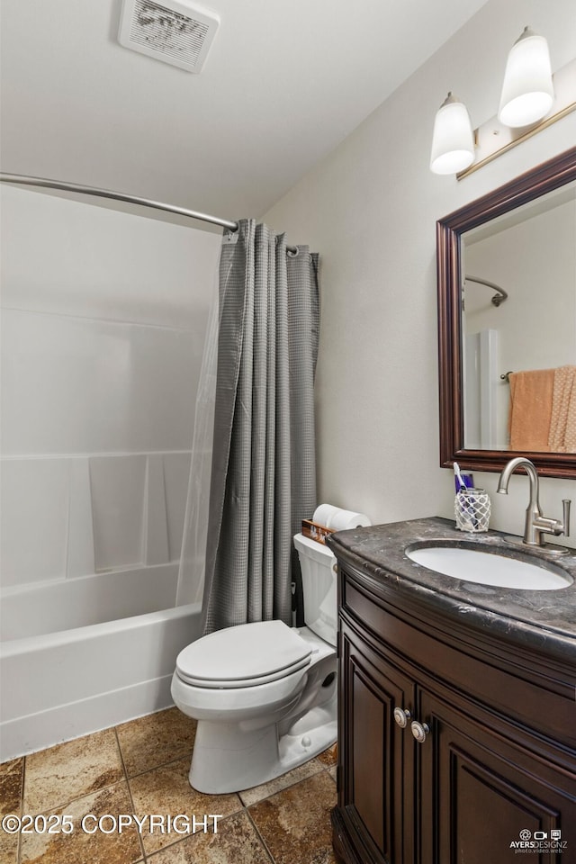 1404 Hedley Dr, Kenai, AK 99611 - full bathroom with toilet, shower / tub combo, and vanity