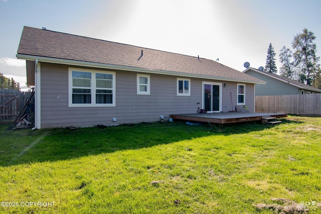 1404 Hedley Dr, Kenai, AK 99611 - back of property featuring a deck