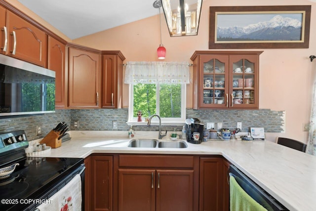 4245 Scenic View Dr, Anchorage, AK 99504 - kitchen featuring appliances with stainless steel finishes, a sink, backsplash, glass insert cabinets, and a chandelier