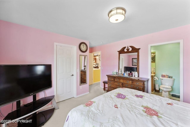 4245 Scenic View Dr, Anchorage, AK 99504 - carpeted bedroom featuring ensuite bath and baseboards