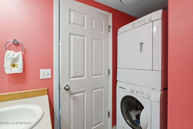 4245 Scenic View Dr, Anchorage, AK 99504 - washroom with stacked washer and clothes dryer