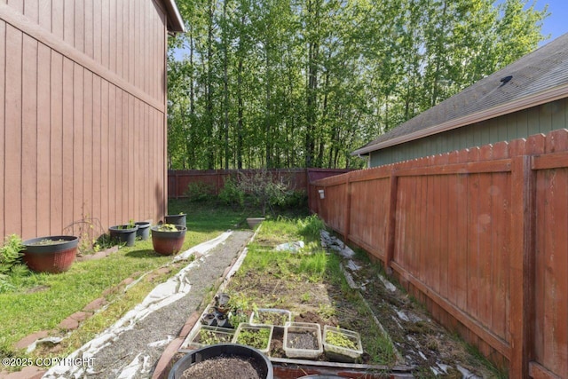 4245 Scenic View Dr, Anchorage, AK 99504 - fenced backyard with a garden