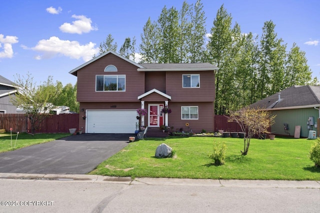 4245 Scenic View Dr, Anchorage, AK 99504 - view of front of home featuring an attached garage and asphalt driveway