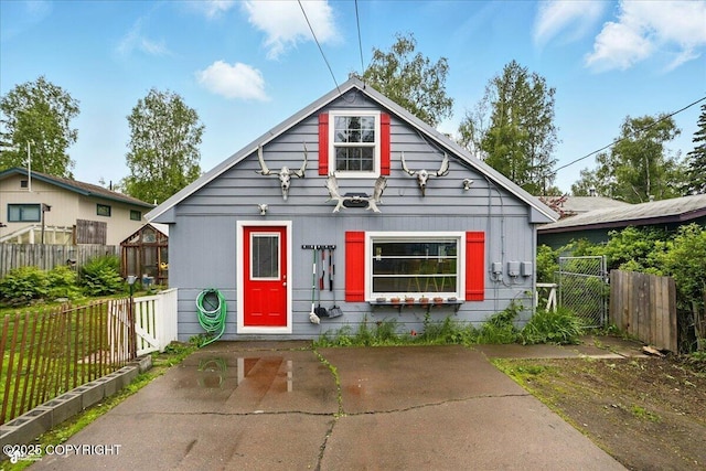 2527 Cottonwood St, Anchorage, AK 99508 - bungalow-style home with a gate