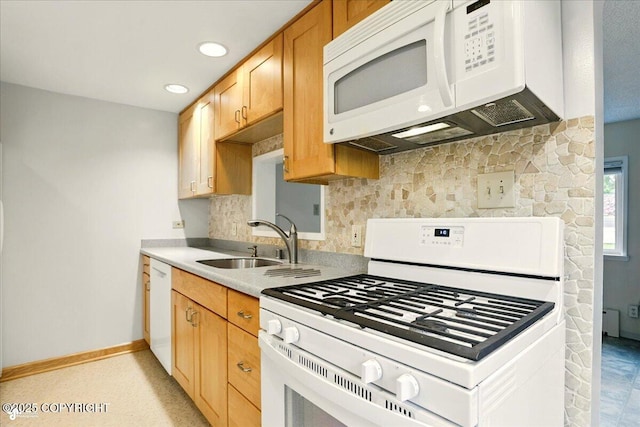 2527 Cottonwood St, Anchorage, AK 99508 - kitchen featuring white appliances, a sink, backsplash, light countertops, and recessed lighting