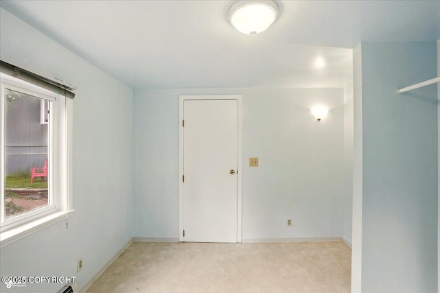 2527 Cottonwood St, Anchorage, AK 99508 - unfurnished room featuring baseboards