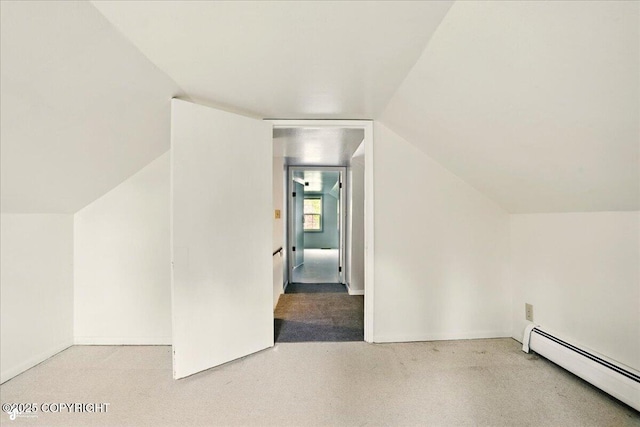 2527 Cottonwood St, Anchorage, AK 99508 - bonus room with a baseboard radiator, carpet flooring, lofted ceiling, and baseboards