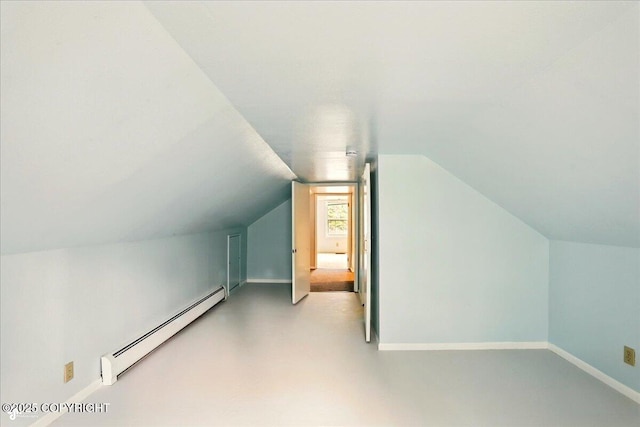 2527 Cottonwood St, Anchorage, AK 99508 - additional living space featuring baseboard heating, lofted ceiling, and baseboards